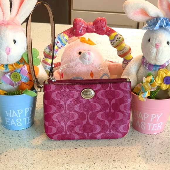 Coach Handbags - Coach Pink Wristlet with Logo Detail